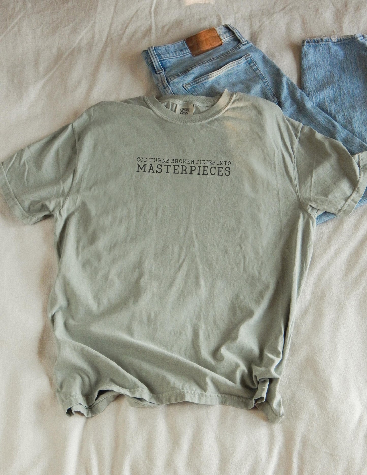 God Turns Broken Pieces Into Masterpieces Shirt: Christian Graphic Tee